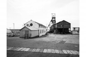 View from North of building containing electrical sub-station and fire station (left), and headstock and car hall (centre).