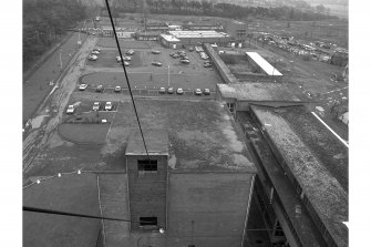 View from West from top of No. 3 shaft headframe showing service buildings and East winding engine house.