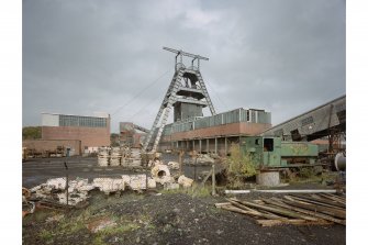 View of No. 3 shaft headframe, North winding engine house and car hall from South.