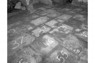 View of numbered flagstones, room 6