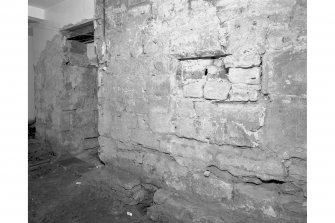 View of South wall showing blocked opening, room 11