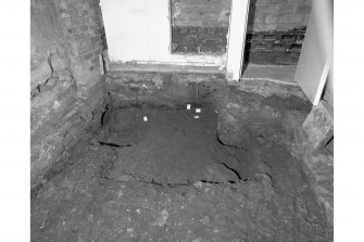 View of floor with metalled road exposed, room 11