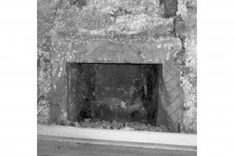 View of fireplace in East wall, room 15
