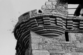Detail of corbelled 'round' at SW angle.