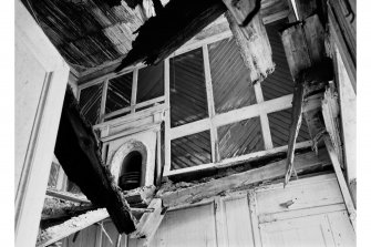 Interior.
Tower house, detail of panelling and fireplace.