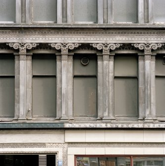 View of the columns on the first floor of the W facade.
