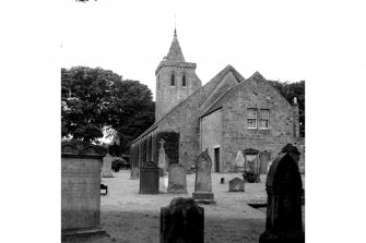 Part view from north east of Church and churchyard
