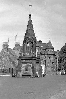 General view from east of Bruce Fountain, with Falkland Palace in the background.