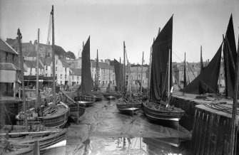 View of East Shore harbour, Pittenweem, with fishing boats.