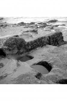 Old Harbour.
Post-holes in rock.