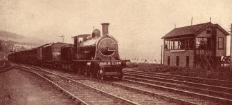 Dingwall Station.
Highland Railway train checked at Dingwall signal box.