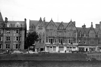 Scanned image of general view of facade from opposite side of the river Ness.