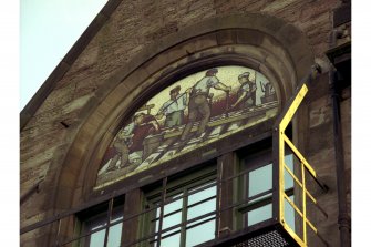 Rose Street Foundry Office, 96-104 Academy Street.
Detail of panel on Rose Street frontage of men working in the Foundry.