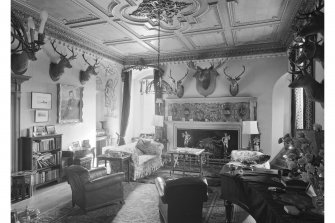 Balnagown Castle.
Interior-view of North end of Trophy Room.