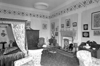 Balnagown Castle.
Interior-view of Red Room with an early C17 stone chimney piece brought from The demolished Meikle Daan.