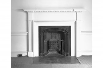 Interior-detail of chimneypiece on South East wall in end apartment on First Floor of North West wing