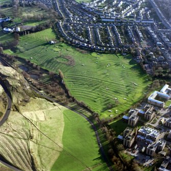 Oblique aerial view of Prestonfield centred on a golf course and rig, taken from the NNW.