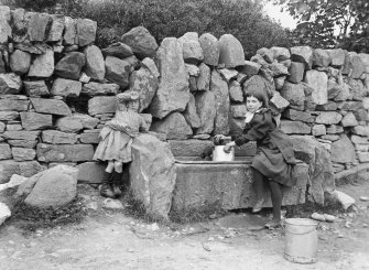 Cairnmore House, Port Ellen.
View of two girls posing by water trough.