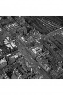 Edinburgh. Oblique aerial view showing High Street between North Bridge and Lawnmarket, with St Giles' Cathedral on left and City Chambers on right.