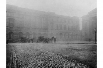 General view of Signet Library looking from High Street, with two horses and carriages in front of building