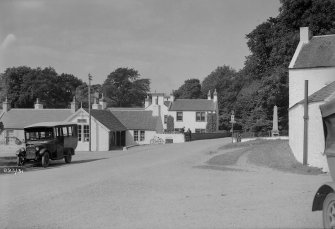 Bridgend, Islay.
General view from South towards bridge, including post office and parked car.
Insc:'893/31'
