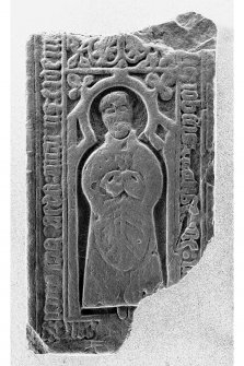 Chapel, Texa, Islay.
Detail of fragment grave-slab with priest (IB199).