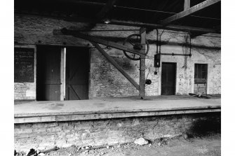 Interior view of goods shed showing whip crane by James Tod of Edinburgh, Hawick railway station