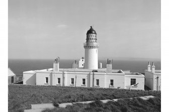 Scanned image of a photograph showing  Dunnet Head Lighthouse, view from S showing main building and tower