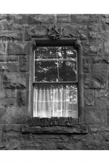 Dunrobin Place.
Detail of upper shield on gable end showing slater's insignia.