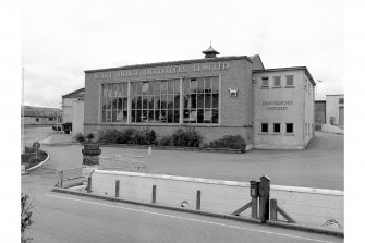 View from SW showing main building and entrance.