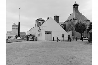 Glenlossie Distillery
View from W showing malting kiln and main buildings