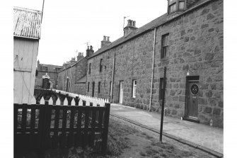 Aberdeen, Footdee, Fisher Cottages
View from WSW showing NW front on South Square of numbers 1-7 Middle Row