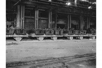 Bellshill, Clydesdale Street, Clydesdale Tube Works, interior
View showing charging wagons in open hearth melting shop