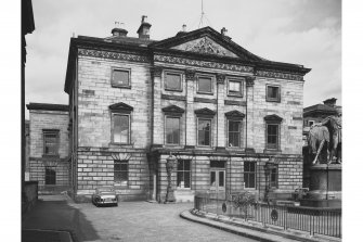 View of front facade and courtyard.