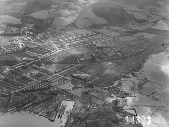 CAM oblique no.14323, 25 June 1943. Dumbarton with shipbuilding yard and Blackburn flying boat works in view.