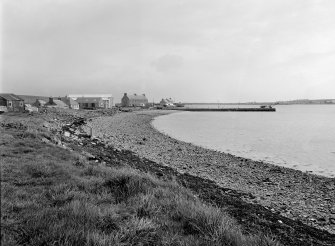 Burray, Pier
Distant view from WNW showing WNW front of pier and W corner of warehouse