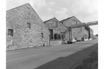 Kirkwall, Highland Park Distillery
General view from N showing WNW front of S bonded store and NW front of stillhouse