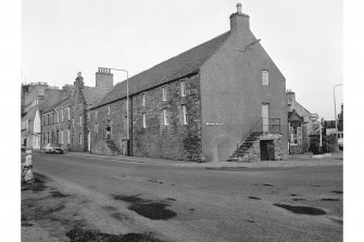 Kirkwall, 22 Harbour Street, The Girnal House and 20 Harbour Street, The Girnal-Keeper's House
View from WNW showing N front of keeper's house, N front and W front of girnal