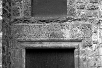 Detail of inscribed lintel above North East wing main entrance