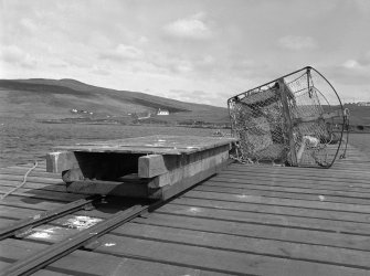 Voe, Jetty
View from S showing wagon on jetty