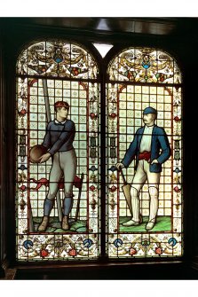Stained glass window representing Rugby and Cricket in the Oyster Bar at Edinburgh's Cafe Royal.