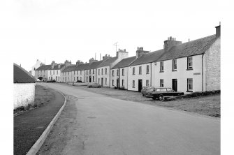 Islay, Port Charlotte
General view from N showing NE front of cottages on N tip of Main Street