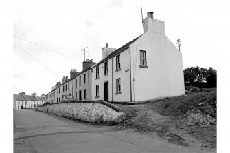 Islay, Port Charlotte
General view from N showing cottages on Main Street whose main entrances point ENE