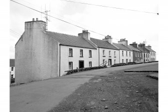 Islay, Port Charlotte
General view from N showing cottages on Main Street whose main entrances point WNW