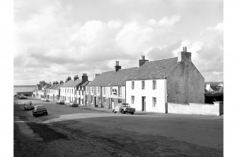 Islay, Bowmore, Main Street
General view from SSE showing ESE front of cottages on NE side of Main Street