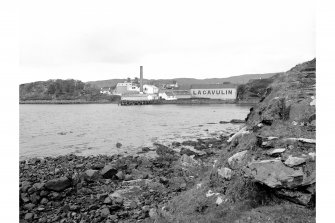 Islay, Lagavulin Distillery
Distant view from SE showing S front of distillery with pier in foreground