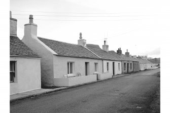 Seil, Ellanbeich, 1-41, Slate Quarry Workers' Dwellings
View from W showing SSW front of numbers 17-20 with numbers 21-24 in distance
