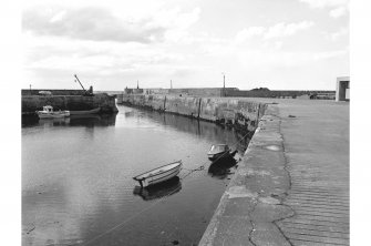 Gardenstown, Harbour
View from SE showing SW front of N pier and N tip of ESE front of S pier