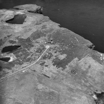 Flotta, Stanger Head, oblique aerial view, taken from the NNW, centred on the Naval Signal Station, and showing the Coast Battery in the top left-hand corner of the photograph.