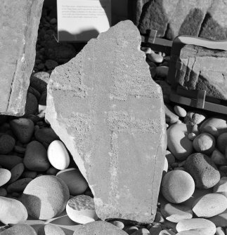 View of Drainie no.19 cross slab fragment on display in Elgin Museum.
